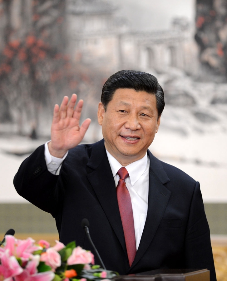 2012年11月15日，剛剛在中共十八屆一中全會上當(dāng)選中共中央總書記的習(xí)近平在北京人民大會堂同采訪十八大的中外記者親切見面。新華社記者 謝環(huán)馳 攝