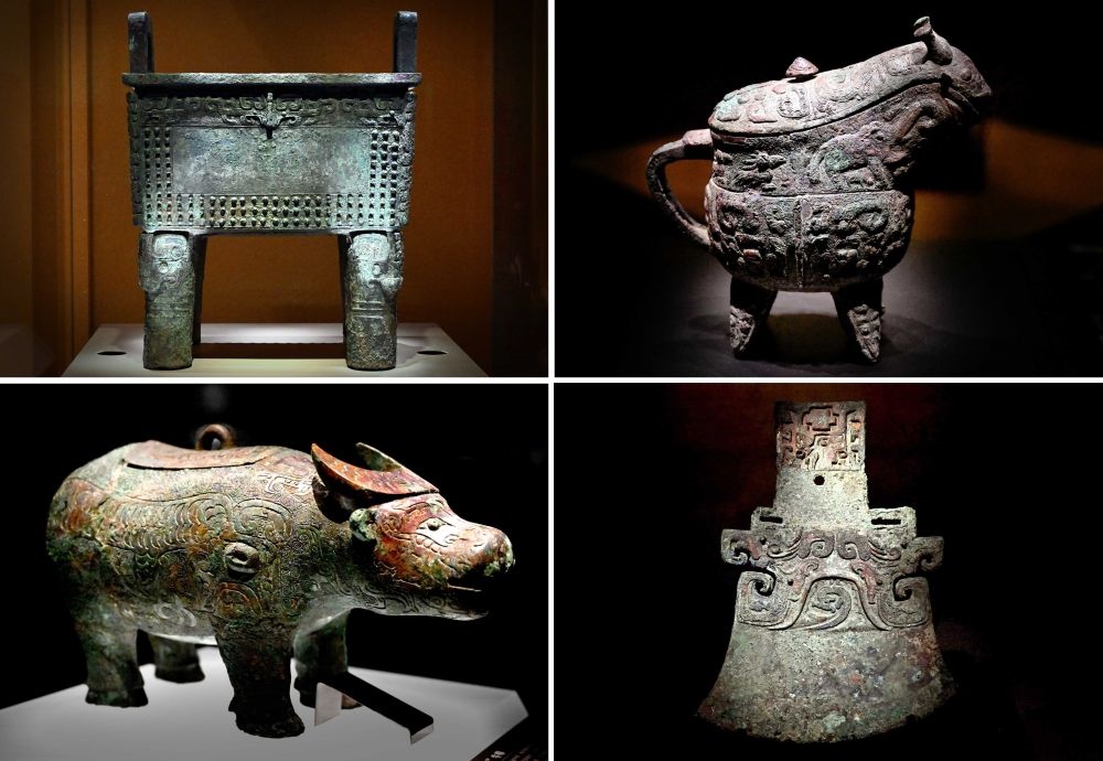 這是殷墟博物館新館內(nèi)展出的“司母辛”銅鼎（左上）、“亞長”銅?。ㄓ疑希?、“亞長”牛尊（左下）、“亞長”銅鉞（拼版照片，2月23日攝）。